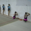 Gymnastky mohly sledovat sv soupeky pouze skrze kvrky v plent oddlujc rozcviovac prostor od zvodn plochy, MR spolench skladeb, Brno 27.11.